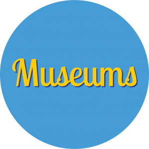 Decorative circle with text that says Museums.