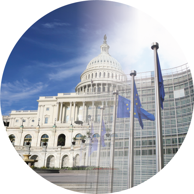 Image of the Capitol building fading into an image of the European Commission.